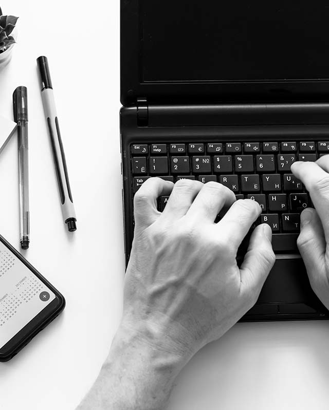 top-view-of-a-man-typing-on-a-laptop-keyboard-2025-01-08-23-08-28-utc_2